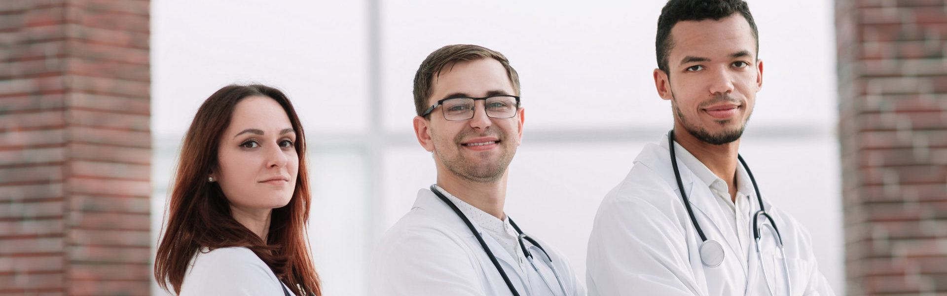 three medical students posing
